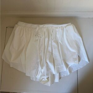 Gold Hinge flowy shorts with athletic lining. NWT
